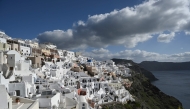 This photograph shows a general view of the Oia village on the Greek island of Santorini while the authorities restrict the access to the tourists in some areas as a precaution due to recent seismic activity on February 5, 2025. Photo by STRINGER / AFP