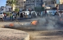 Yemenis burn tyres to protest against dire living condition and the lack basic necessities such as electricity and gas, in Aden on February 6, 2025. (Photo by Saleh Al-OBEIDI / AFP)
