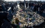 Mourners leave flowers and candles at the memorial site outside the adult education center Campus Risbergska school in Orebro, Sweden, on February 6, 2025 two days after a shooting there left eleven people dead. Photo by Christine Olsson/TT / TT NEWS AGENCY / AFP