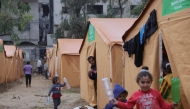 Displaced Palestinian families take refuge in tents installed near their damaged homes in Jabalia in the northern Gaza Strip on February 6, 2025. Photo by Bashar TALEB / AFP