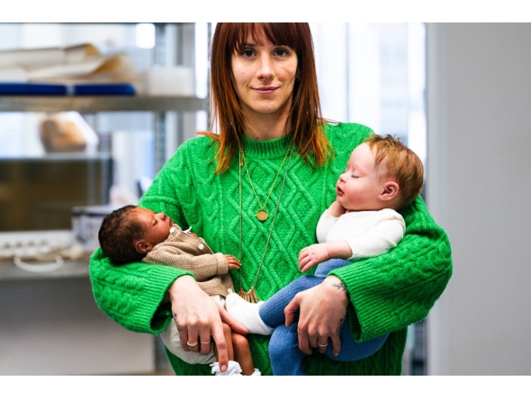 (Files) Co-Owner and Commercial Director of Cinebebe and Studio Junon Justine Ray Le Solliec poses with fake babies created by Cinebebe (Cinebaby) in Saint-Denis, suburbs of Paris, on January 24, 2025. (Photo by Julie Sebadelha / AFP)