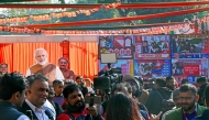 Journalists gather at Bharatiya Janata Party state headquarters in New Delhi on February 8, 2025, as BJP leads in Delhi legislative assembly polls. (Photo by Arun SANKAR / AFP)