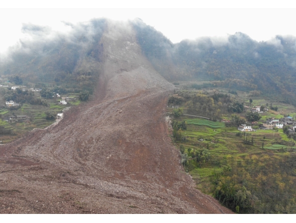 YIBIN, Feb. 8, 2025 (Xinhua) -- This photo taken on Feb. 8, 2025 shows the site of a landslide in Jinping Village, Junlian County in the city of Yibin, southwest China's Sichuan Province.