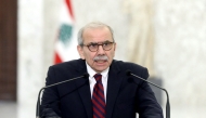 This handout picture released by the Lebanese presidency shows designate Prime Minister Nawaf Salam delivering a statement to the press at the presidential palace in Baabda, east of Beirut on February 8, 2025. (Photo by Lebanese Presidency / AFP)