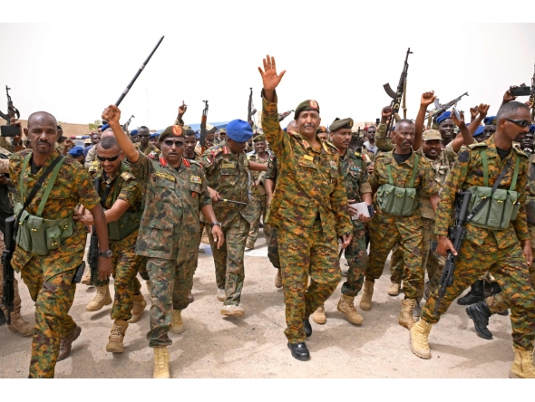 (FILES) Sudanese army chief Abdel Fattah al-Burhan visits the Flamingo Marine Base in Port Sudan on August 28, 2023. (Photo by AFP)