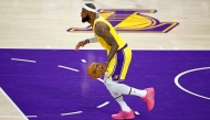 LeBron James #6 of the Los Angeles Lakers handles the ball during the first half of a game against the Oklahoma City Thunder at Crypto.com Arena on February 07, 2023 in Los Angeles, California. Ronald Martinez/Getty Images/AFP

