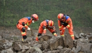 Rescuers work at the site of a landslide in Jinping village in the city of Yibin, in China's southwest Sichuan province on February 9, 2025. Photo by CNS / AFP