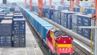  A drone photo shows a cargo train before departure at the Tuanjiecun Station in Chongqing, southwest China, Feb. 10, 2025. (Xinhua/Tang Yi)