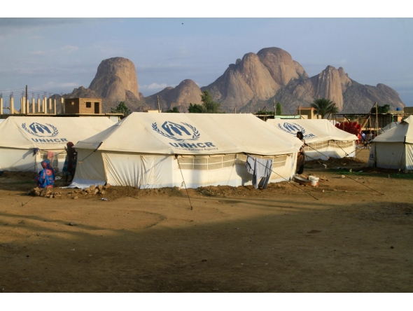 Representational file photo. People already displaced by conflict, rest by tents at a makeshift campsite they were evacuated to following deadly floods in the eastern city of Kassala on August 11, 2024. (Photo by AFP)

