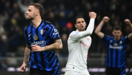 Inter Milan's Austrian forward #08 Marko Arnautovic celebrates after scoring a goal during the Italian Serie A football match between Inter Milan and Fiorentina at San Siro stadium in Milan on February 10, 2025. (Photo by Isabella BONOTTO / AFP)
