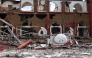 This picture shows the former restaurant area of the now heavily damaged Deira Hotel in western Gaza City, on February 11, 2025, amid the current ceasefire deal. (Photo by Bshar Taleb / AFP)