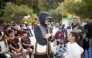 Chairperson of Qatar Foundation H H Sheikha Moza bint Nasser interacting with a child during National Sport Day (NSD) activities held yesterday in Education City. 