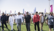 Minister of Municipality H E Abdullah bin Hamad bin Abdullah Al Attiyah (centre) and other officials during National Sport Day activities at Aspire Park yesterday. 