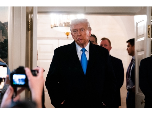 US President Donald Trump arrives to speak to reporters in Washington, DC, on February 11, 2025. (Photo by Allison Robbert / AFP)