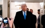 US President Donald Trump arrives to speak to reporters in Washington, DC, on February 11, 2025. (Photo by Allison Robbert / AFP)