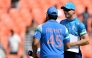 India's captain Rohit Sharma (L) and England's captain Jos Buttler interact during toss at the start of the third one-day international (ODI) cricket match between India and England at the Narendra Modi Stadium in Ahmedabad on February 12, 2025. (Photo by Sajjad HUSSAIN / AFP)