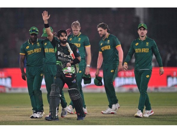 Pakistan's Mohammad Rizwan (C) celebrates after winning the Tri-Nation series third one-day international (ODI) cricket match between Pakistan and South Africa at the National Stadium in Karachi on February 12, 2025. (Photo by Asif HASSAN / AFP)
