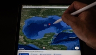 This photo illustration shows the Gulf of Mexico branded as Gulf of America displayed on the Google Maps application on a tablet on February 11, 2025, in Bogota, Colombia. (Photo by Luis ACOSTA / AFP)
