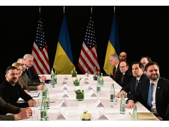 US Vice President JD Vance (R), US Secretary of State Marco Rubio (2nd R) and Ukrainian President Volodymyr Zelensky (L) meet on the sidelines of the 61st Munich Security Conference (MSC) in Munich, southern Germany on February 14, 2025. (Photo by Tobias Schwarz / AFP)