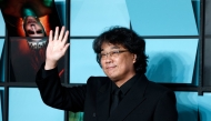 South Korean director Bong Joon Ho poses upon arrival for the World premiere of the film 