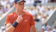 (Files) Italy's Jannik Sinner reacts after a point during his men's singles quarter final match at the Roland Garros Complex in Paris on June 4, 2024. (Photo by Bertrand Guay / AFP)
 