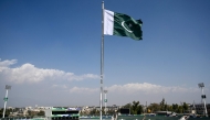 Pakistan's national flag flutters at the Rawalpindi Cricket Stadium ahead of the ICC Men's Champions Trophy one-day international (ODI) cricket matches in Rawalpindi on February 17, 2025. (Photo by Aamir Qureshi / AFP)