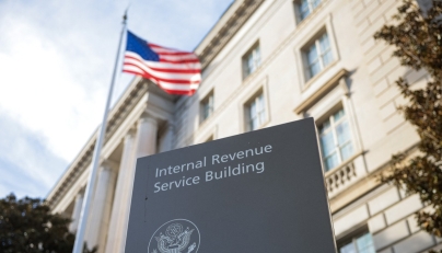 A sign for the Internal Revenue Service (IRS) is seen outside its building on February 13, 2025 in Washington, DC. (Photo by Kayla Bartkowski / GETTY IMAGES NORTH AMERICA / Getty Images via AFP)
