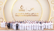 Minister of State for Energy Affairs and the President and CEO of QatarEnergy, H E Saad Sherida Al Kaabi with officials and employees at the 'My Legacy' recognition ceremony.