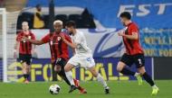 Action during the match between Al Rayyan and Esteghlal at Ahmad Bin Ali Stadium. 