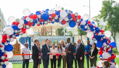 US Ambassador H E Timmy Davis, CPChem CEO Steve Prusak, and members of the Chevron Phillips Chemical team during the inauguration of the playground. 