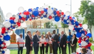 US Ambassador H E Timmy Davis, CPChem CEO Steve Prusak, and members of the Chevron Phillips Chemical team during the inauguration of the playground. 