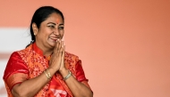 Newly elected Chief Minister of Delhi, Rekha Gupta, gestures after taking an oath during a swearing-in ceremony in New Delhi on February 20, 2025. (Photo by Sajjad Hussain / AFP)