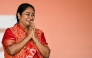 Newly elected Chief Minister of Delhi, Rekha Gupta, gestures after taking an oath during a swearing-in ceremony in New Delhi on February 20, 2025. (Photo by Sajjad Hussain / AFP)