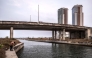 A man fishes inside the Eko Atlantic city project in Lagos, on February 19, 2025. (Photo by OLYMPIA DE MAISMONT / AFP)