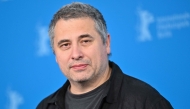 Romanian director Radu Jude poses during a photo call for the film 