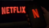 In this photo illustration a computer screen displays the Netflix logo on March 31, 2020 in Arlington, Virginia. Photo by Olivier DOULIERY / AFP