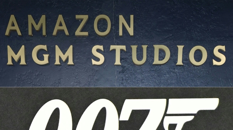 (COMBO) This combination of photographs created on February 20, 2025, shows Amazon MGM Studios logo on display at the celebrate Awards Season 2025 on January 4, 2025 (TOP) and the '007' logo on display during the press preview of the 