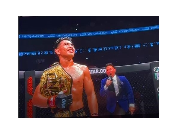 A screenshot of Philippines' Joshua Pacio after clinching the Strawweight MMA World Championship against USA’s Jarred Brooks at the ONE171:Qatar on February 20, 2025.