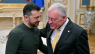  Ukraine's President Volodymyr Zelensky (left) greets US envoy Keith Kellogg at his offices in Kyiv on February 20, 2025. (Photo by Sergei Supinsky / AFP)