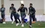 Pakistan's captain Mohammad Rizwan (front) and his teammates warm up during a practice session at the ICC Academy groud in Dubai on February 21, 2025. (Photo by Fadel Senna / AFP)