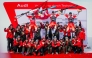 Second-placed Switzerland's Marco Odermatt, first-placed Switzerland's Franjo Von Allmen and third-placed Switzerland's Alexis Monney pose with their staff after the men's downhill event at the FIS Alpine Skiing World Cup in Crans-Montana on February 22, 2025. (Photo by maxime schmid / AFP)