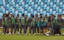 Pakistan's players huddle during a practice session at the Dubai International Stadium in Dubai on February 22, 2025. (Photo by Fadel Senna / AFP)