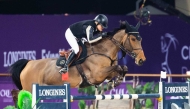 Malin Baryard-Johnsson astride veteran bay mare H&M Indiana clears a rail en route to winning the CHI Al Shaqab CSI5* Grand Prix 1.60m class yesterday.