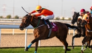 Al Shomos, with Ivan Rossi in the saddle, on his way to win the Al Uqda Local Thoroughbred Trophy. PIC: Juhaim/QREC