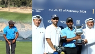 Saleh Al Kaabi (left); Qatar Golf Association (QGA) General Secretary Fahad Nasser Al Naimi presents the winner's trophy to Qatar's Saleh Al Kaabi. QGA Board member Mohamed Faisal Al Naimi (left) is also present.