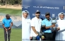 Saleh Al Kaabi (left); Qatar Golf Association (QGA) General Secretary Fahad Nasser Al Naimi presents the winner's trophy to Qatar's Saleh Al Kaabi. QGA Board member Mohamed Faisal Al Naimi (left) is also present.