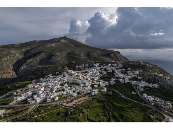 An aerial view shows the main town of Amorgos, on the Greek island of Amorgos, in the Aegean Sea, on February 15, 2025. (Photo by Angelos Tzortzinis / AFP)
