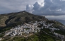 An aerial view shows the main town of Amorgos, on the Greek island of Amorgos, in the Aegean Sea, on February 15, 2025. (Photo by Angelos Tzortzinis / AFP)
