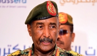 Sudan's army chief General Abdel Fattah Al-Burhan addresses the conference to support initiatives for e-learning projects and the enrichment of education infrastructure in the Darfur region and the launch of smart education platforms, in Port Sudan on February 17, 2025. (Photo by AFP)