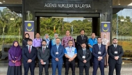 Members of the Qatari delegation with Malaysian officials